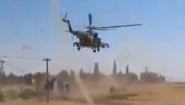 SNIMAK SUKOBA RUSA I AMERIKANACA U SIRIJI: DŽinovski Mi-8 im lebdeo tik iznad glave, podigao oblak prašine i kamenja (VIDEO)