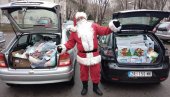 TATE ZA DECU ODUŠEVILE SIROMAŠNE MALIŠANE: Donacije pretvorili u paketiće, Deda Mraz delio poklone